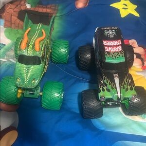 Green and Black Monster Truck Toys